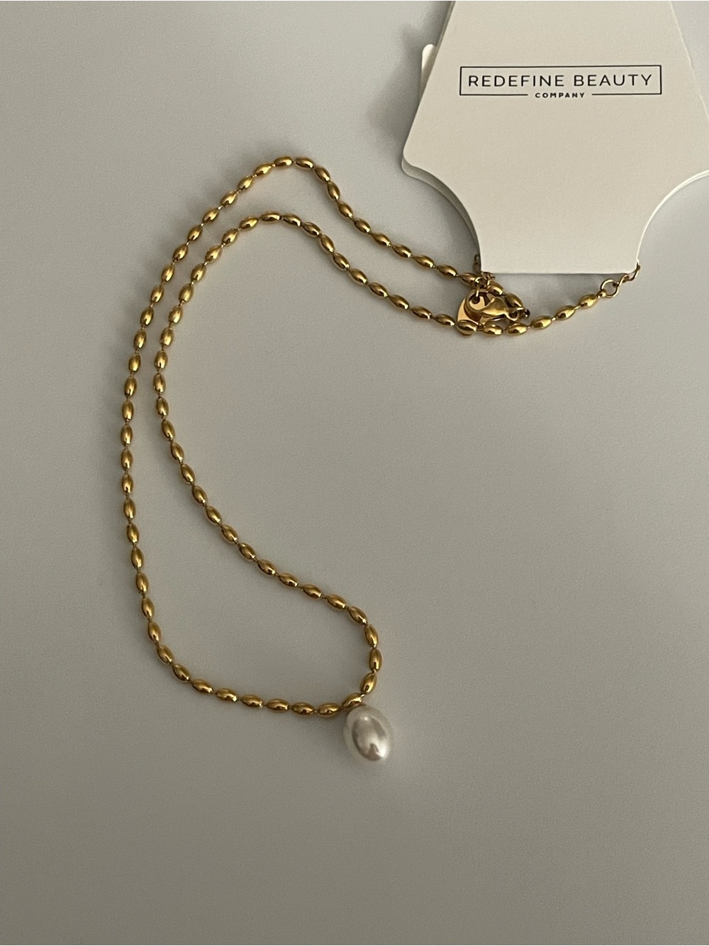 Redefine Beauty Gold Chain Necklace with White Pearl Drop
